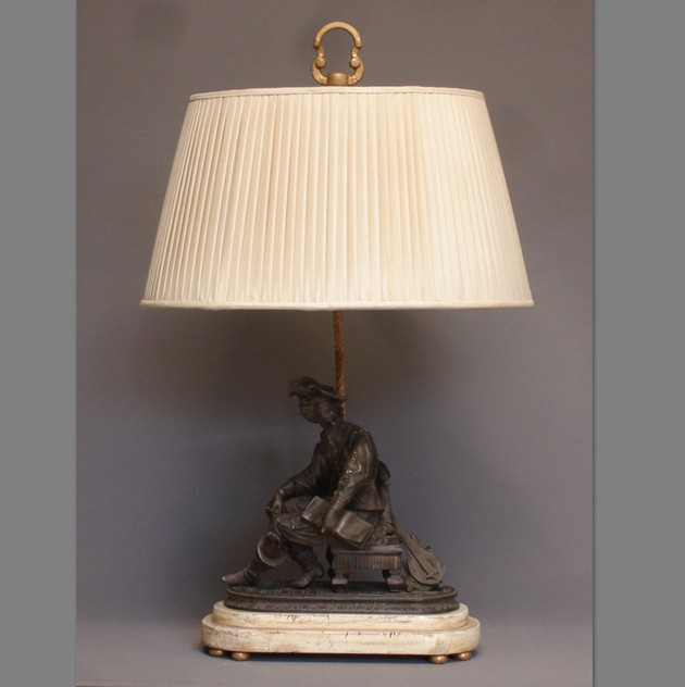Antique man on bench mounted as lamp. -empel-collections-vintage figurine lamp oval.bmp_main_636053013831966243.jpg